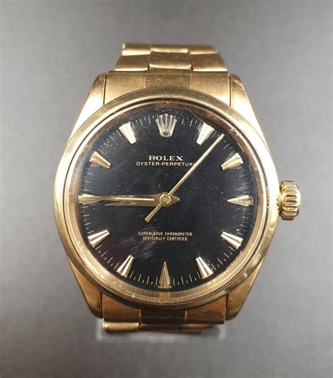 vintage gold silver rolex black face|Rolex oyster perpetual black dial.